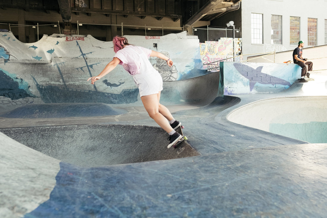Woman skating at skatepark
